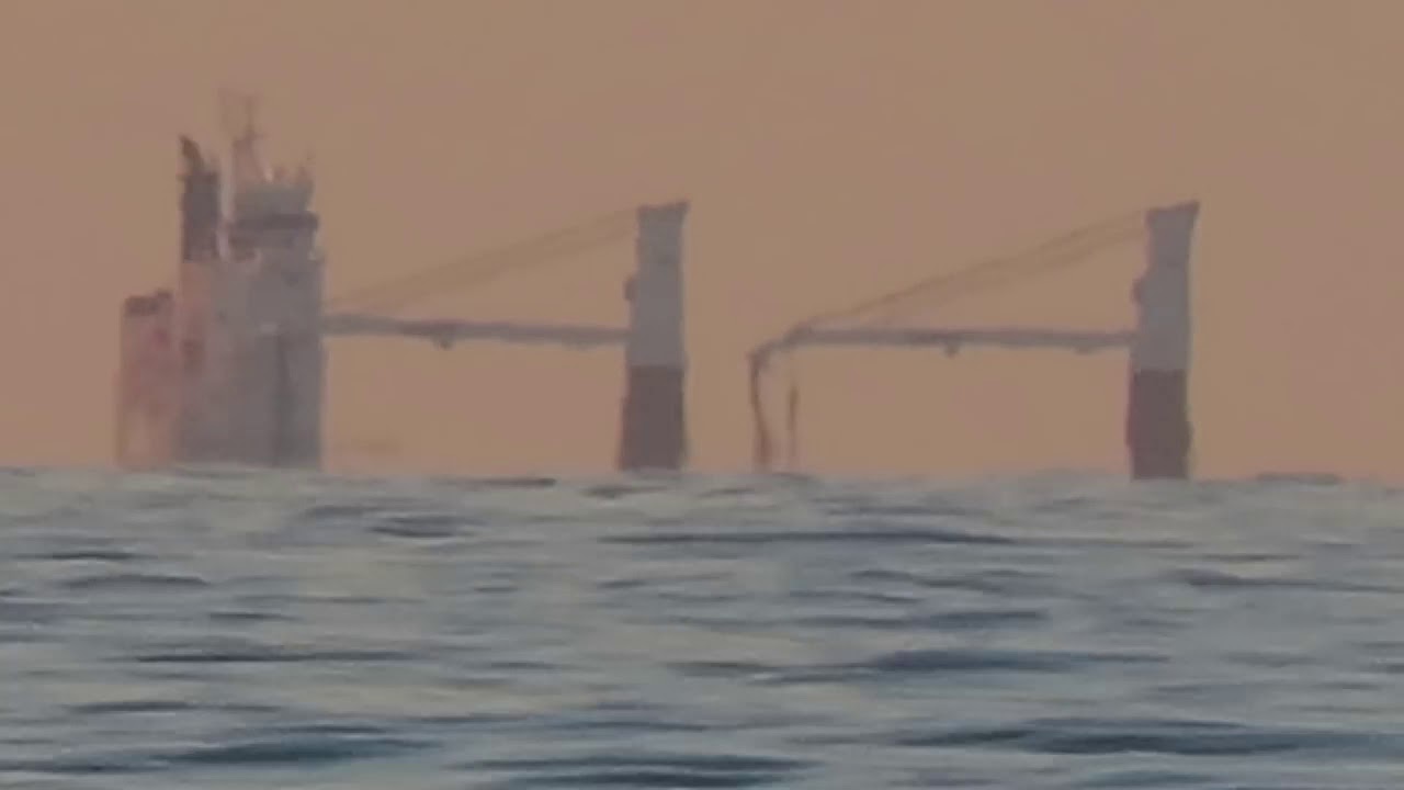 Ship partly below horizon