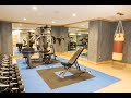 This Basement Has it All: Home Gym, Bar, and a Secret