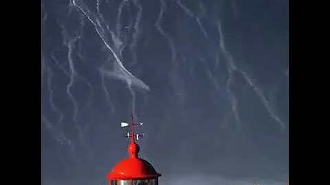 Guy surfing 100 foot tall wave