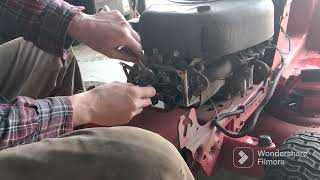 how to adjust valves on a Troy-Bilt riding lawn mower Briggs & Stratton 17 half horse power motor
