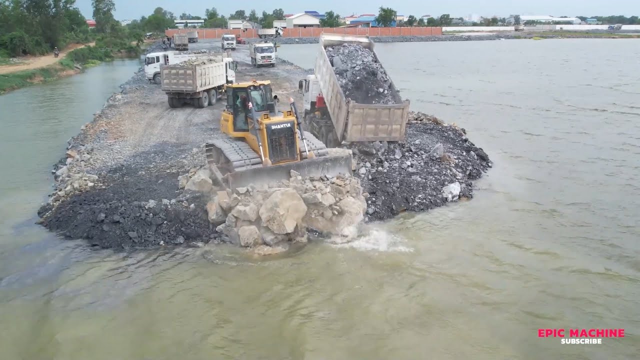 Unbelievable! The Journey in Action! Sequential Incidents of a Bulldozer Moving stone 2 Deep Lake!