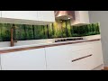 Printed forest landscape glass splashback  modern kitchen design by creoglass