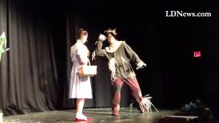 The Scarecrow meets Dorothy in The Wizard of Oz. LCT dress rehearsal