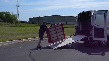 Ford Transit Medium Roof with a High Capacity, spring assisted, swivel, and 3rd section loading ramp