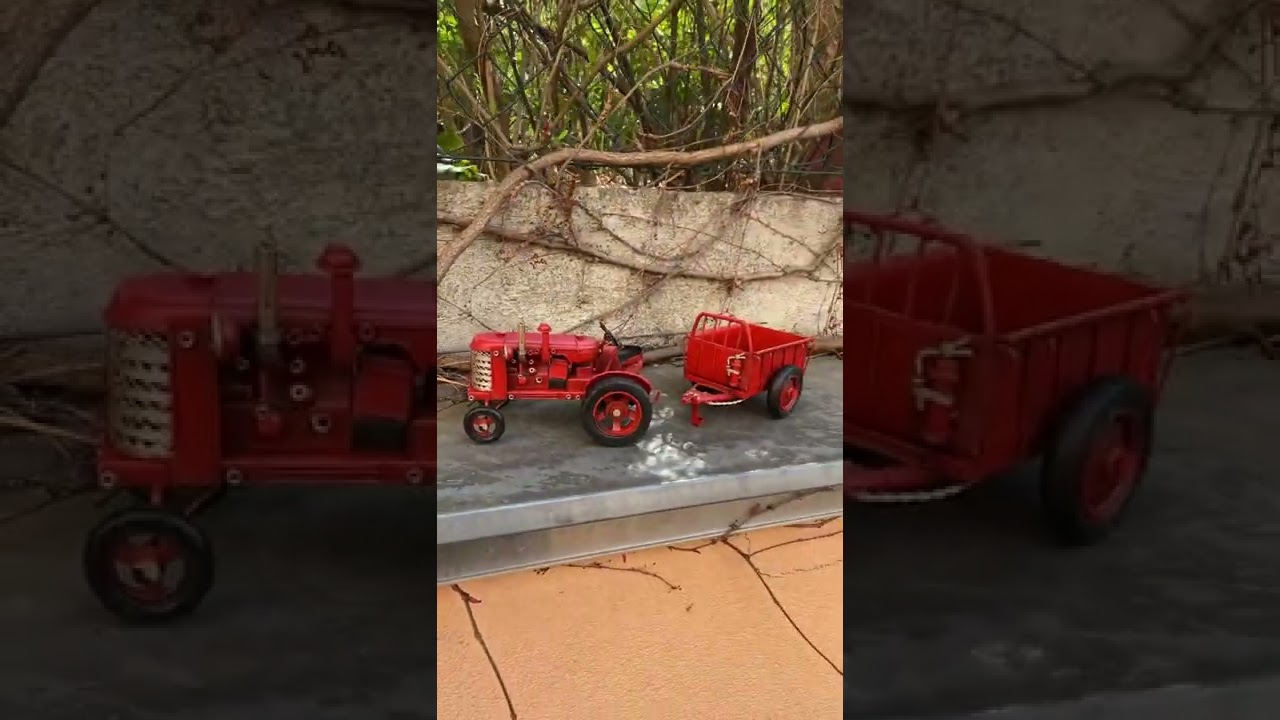 A TIN MODEL OF A TRACTOR WITH TRAILER