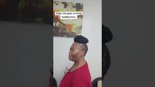 Palm Roll Updo On Long Healthy Locs Styled To Perfection.
