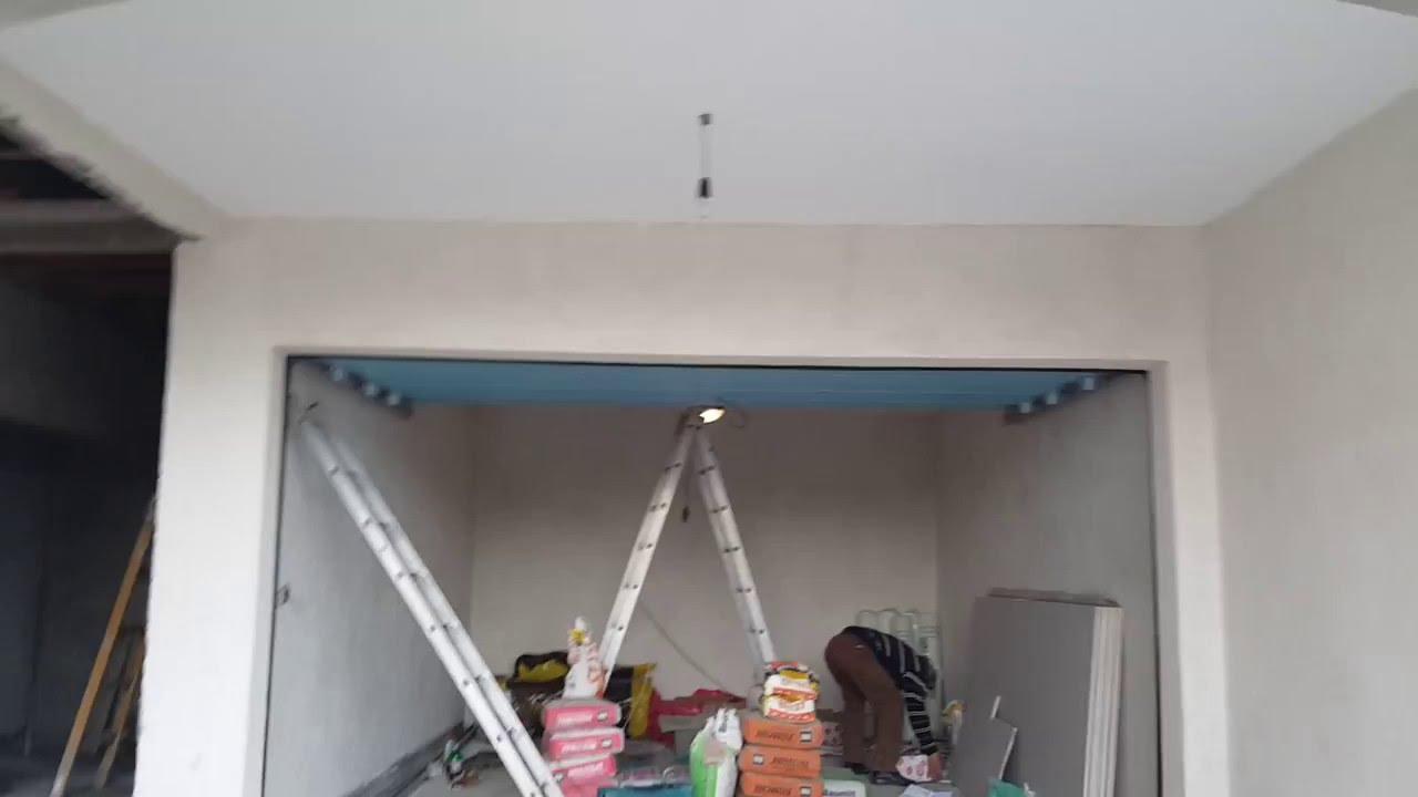 usa de garaj culisanta rabatabila sau rulanta pe tavan horezu 0720959626