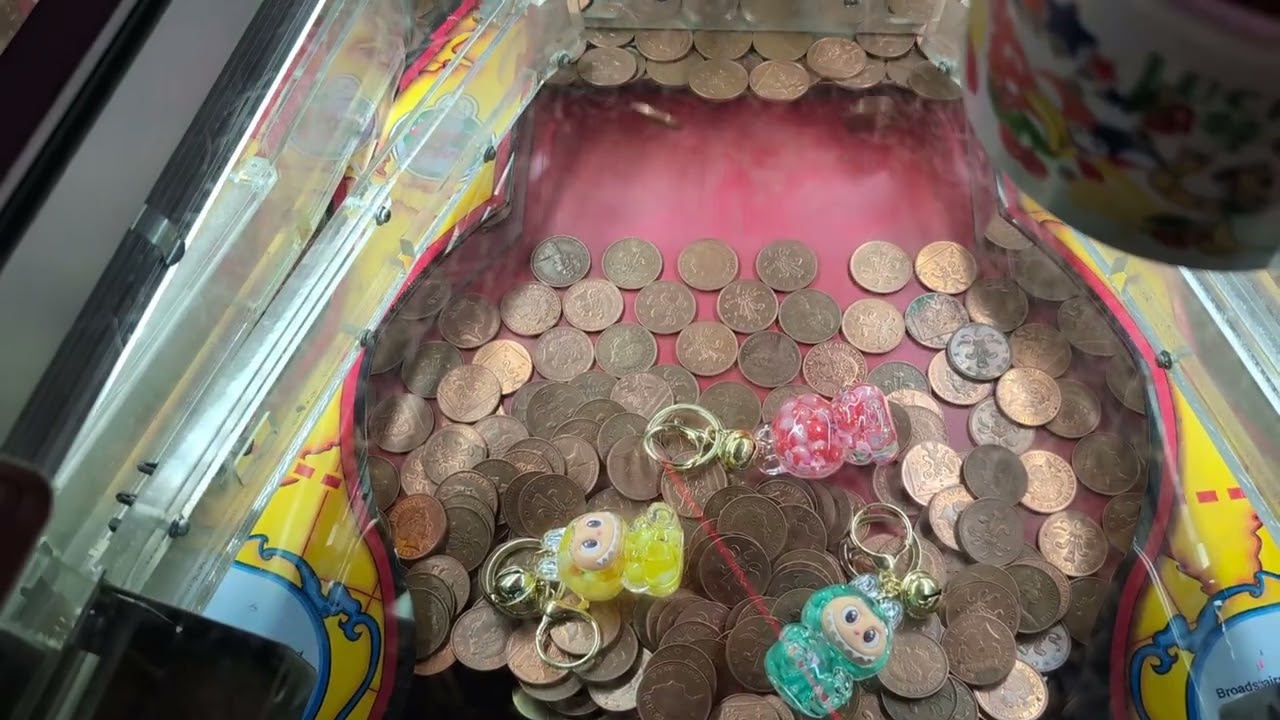 Playing The Round The World Coin Pusher At Gold Rush Amusements