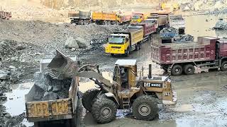 Caterpillar 966 Loader Loading Dump Truck withMassive PowerGiant CAT 966 Wheel Loader Loading Dumper