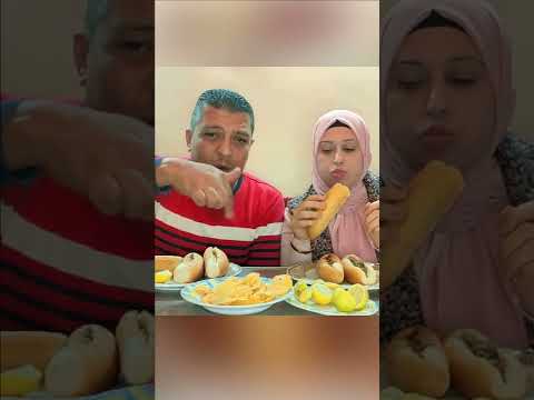 تحدى اكل 20 سندوتش كبده وسجق والعقاب شديد