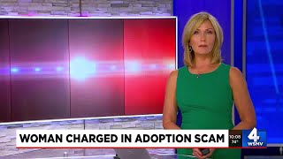 Woman charged in adoption scam