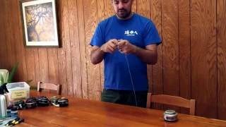 Self winding in-tree throwline reel