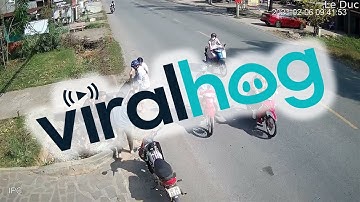 Man on Motorbike Falls Over || ViralHog