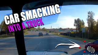 Dashcam Footage of a Car Going Into the Main Road Without Checking Traffic Smacking Into a Truck