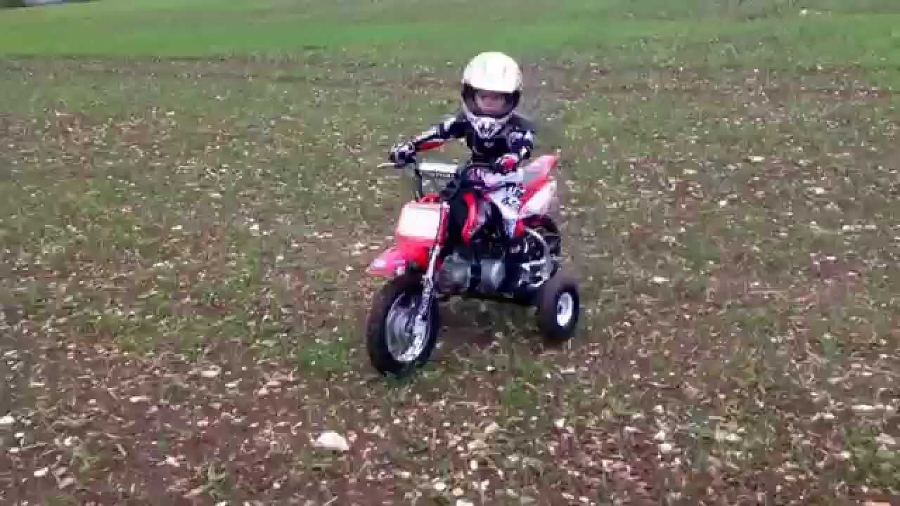 Honda Crf 50 with training wheels Charlie 3 years old first ride