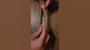 Cord Cut Test - Al Mar Eagle Lockback Honey Jigged Bone on 550 Paracord