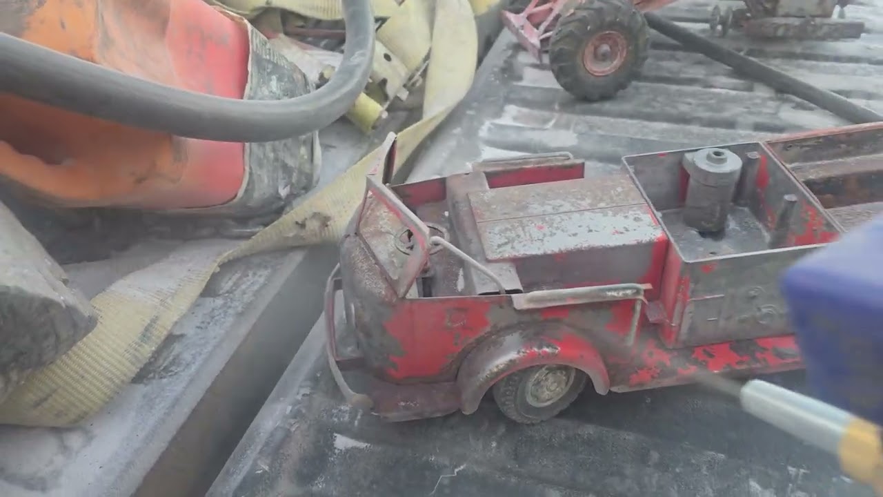 Sandblasting the old fire truck and belly dump for Eli