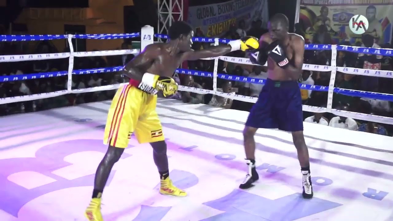 BOXING - DANCING MASTER LATIB MUWONGE BEAT KENYA'S GEORGE OWANO