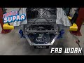 Formula Supra gets a DomSpec Subframe, Wisefab Suspension kit, and Radium Fuel cell.