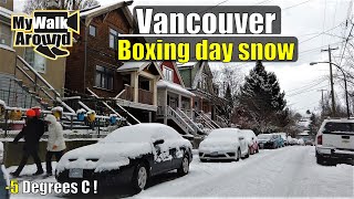 Snowy freezing boxing day in Vancouver - Commercial drive storefronts and residential streets