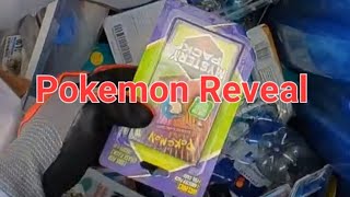 Pokemon cards and Apple earpods cases in a dumpster