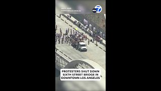 Protesters shut down Sixth Street bridge in downtown Los Angeles