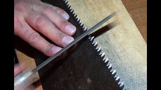 Как точить ножовку ромбовидным напильником. How to sharpen a saw