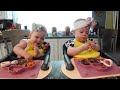Twins try cheesesteak!