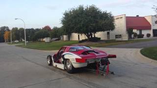 Testing customer's car in front of MRE shop