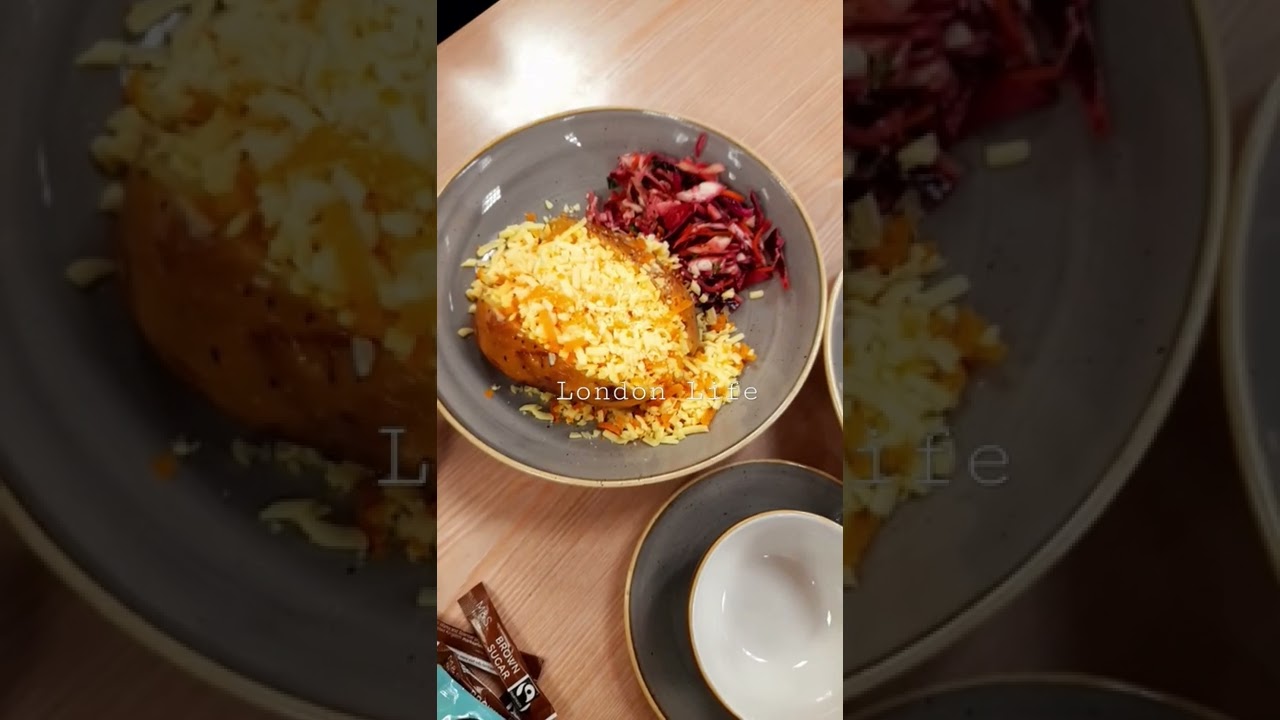 Today's Lunch Yummy Jacket Potato With Cheese and Tasty Colour full Salad And Hot Tea 