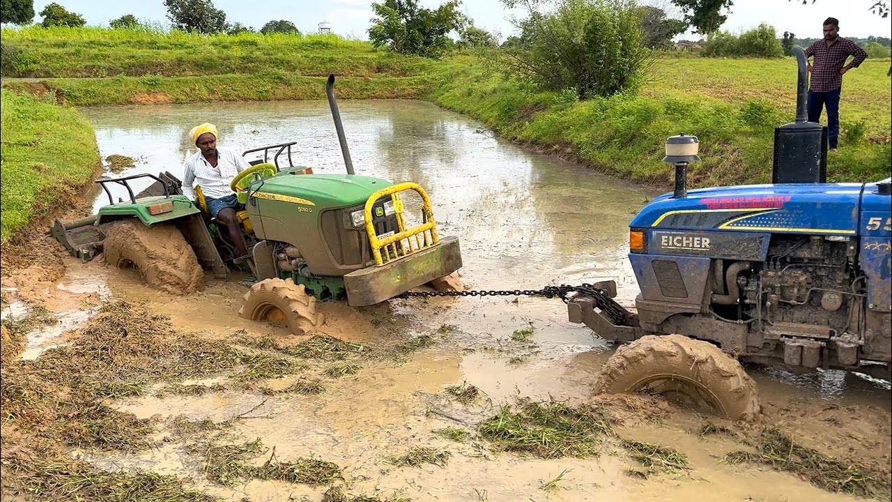 Tracktor Stick John Deere tractor stuck in mud Rescued by Eicher tractor | tractor ...