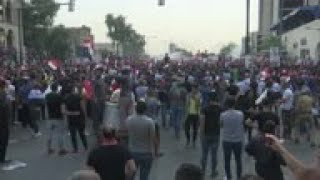 Police fire tear gas as hundreds protest in Baghdad