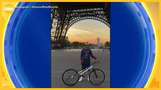 Cyclist bikes up Eiffel Tower