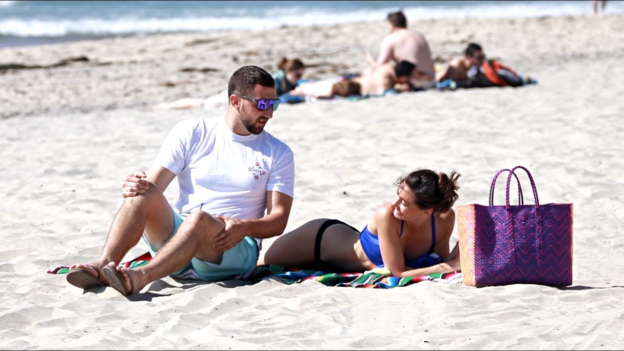 Sitting on People's Beach Towels