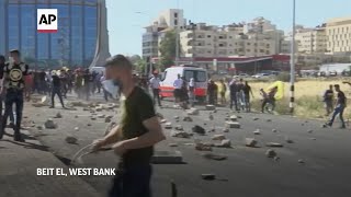 Israelis, Palestinians face off in West Bank
