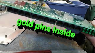 Scrapping for gold and copper in an ethernet switch to make money