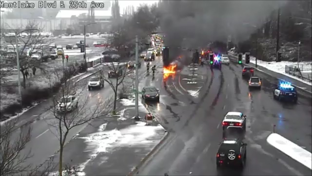 [Traffic Cam & Scanner] Seattle FD knocks down car fire in the snow ...