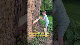 learning how to use his tools on his first treehouse #treehouses #autismawareness#country #trythat