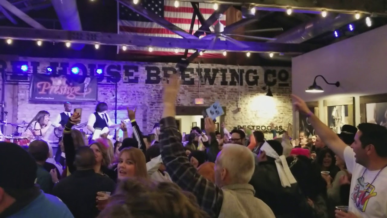 Prestige performing You Shook Me All Night Long at BarrelHouse Brewing