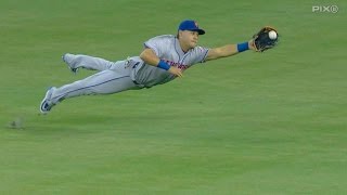 Nym Conforto Dives For A Great Catch In Center