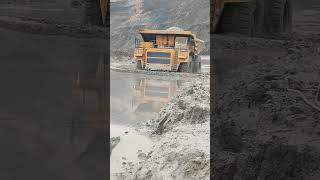 Belaz Truck Crossing Deep Water Makes A Huge Tsunami