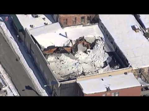 Raw: Heavy Snow Causes Roof to Collapse