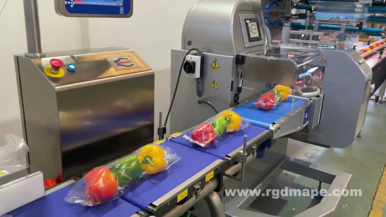 MÁQUINA EMPAQUETADORA FLOW-PACK PARA ENVASADO DE PIMIENTOS CON CONTROL DE PESO. RGDMAPE,S.L.