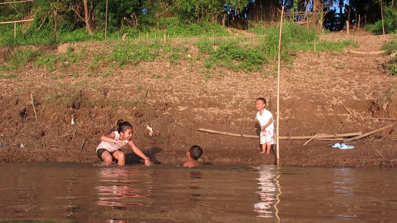 Kids Bathing In River