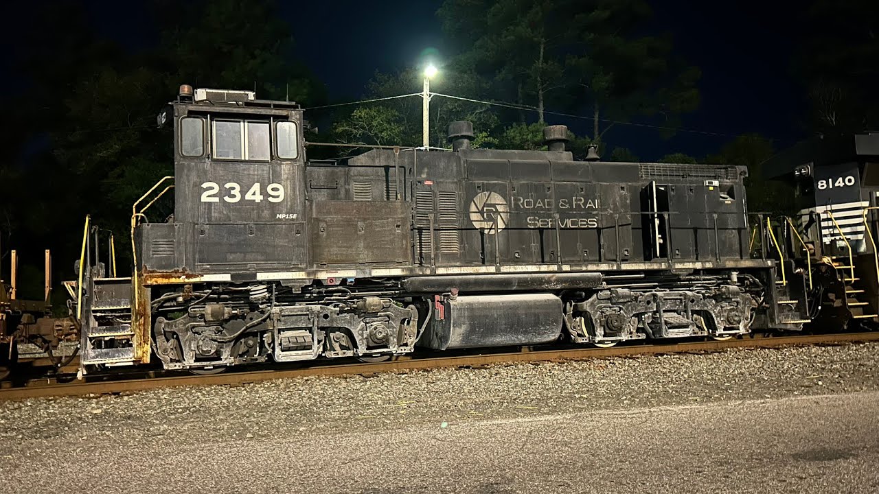 CSX YN2 on a coal train, 1776 on a stack train and a MP15 on L795
