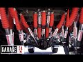 Fitting a ridiculous amount of shock absorbers to a car
