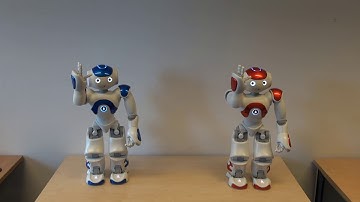 Two NAO robots dancing in sync to Titanium