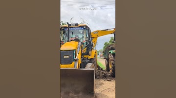 JCB 3DX PLUS LOADING COW DUNG IN TRACTOR