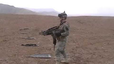Army Solidier dual-wields some M249