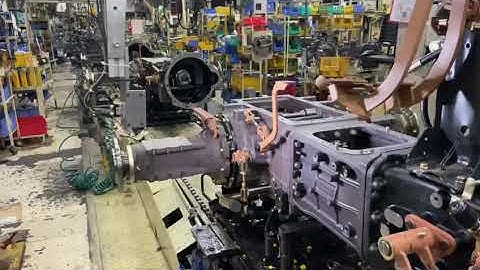 Vision guided robotics in tractor production line.